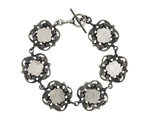 Rusty Thought Shield Flower Bracelet