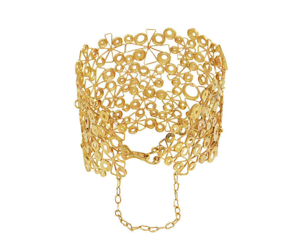 Holes with Discs and Stars Cuff Bracelet