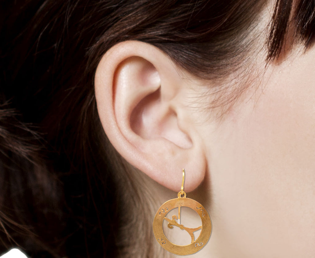 Judy Geib Small Gold Compass Earrings Close Up Profile